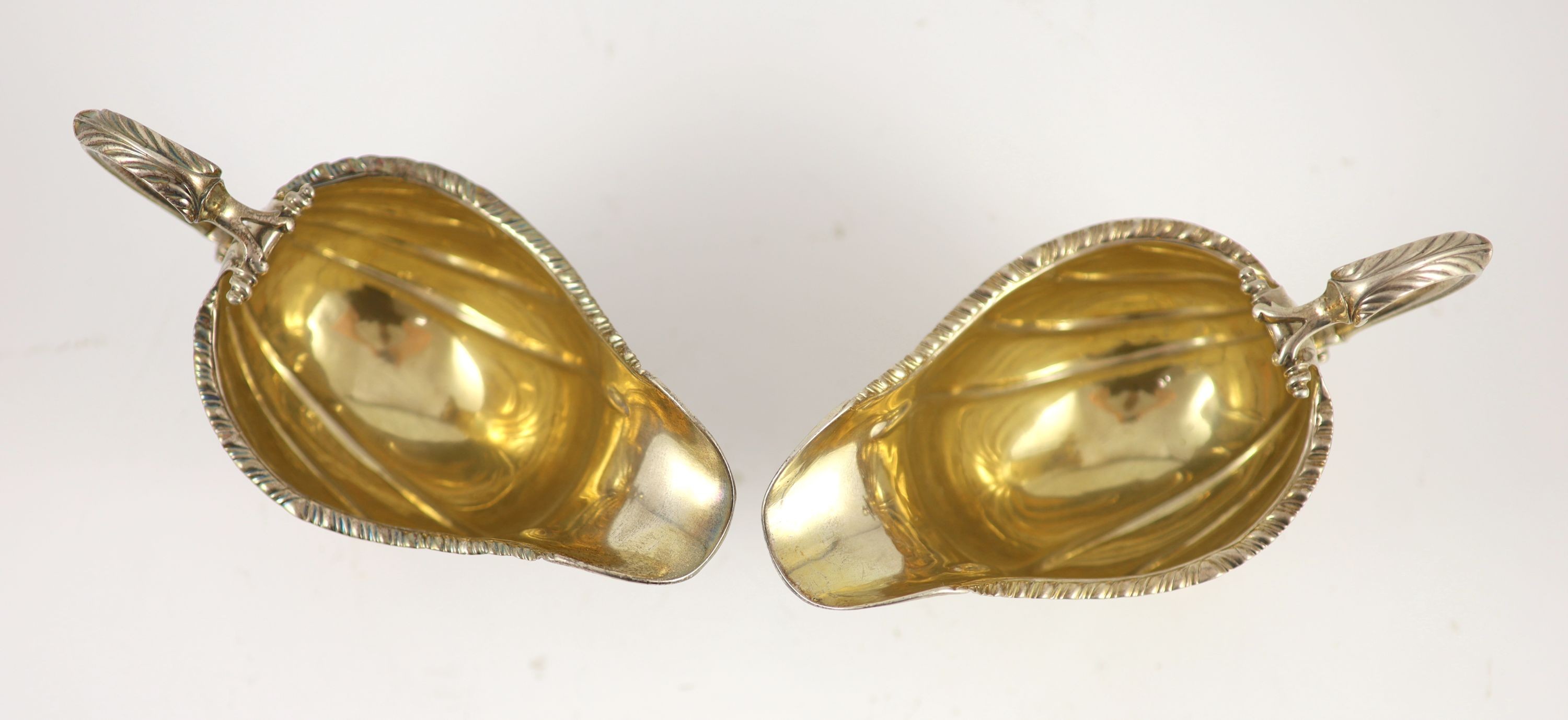 A pair of early George III silver oval pedestal sauce boats by Whyte & Holmes?